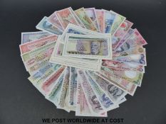 Fourteen sets of specimen banknotes from around the world, issued by the Franklin Mint,