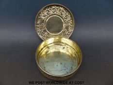 A Huntley and Palmer tin embossed with birds,