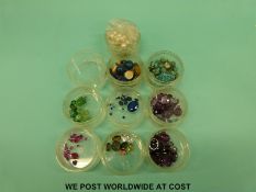 A quantity of loose gemstones to include pearls, garnet cabochons, amethyst, turquoise, tigers eye,