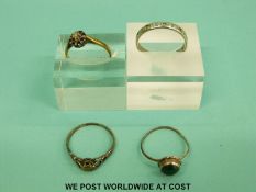 A 9ct gold ring set with a diamond and sapphires,