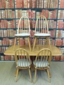 An Ercol light elm table with refectory style supports and four chairs (H72xL153xW85cm)