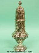 An Edward VII hallmarked silver sugar caster with wrythen decoration, London 1907,