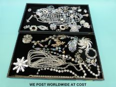 A quantity of costume jewellery to include Weiss brooch and bracelet, crystal necklaces,