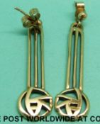 A pair of 9ct gold openwork drop earrings