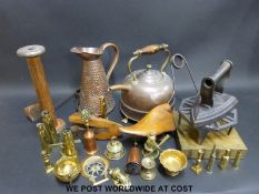 A collection of copper and brassware etc to include shoe trees, a hammered jug,