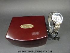 Meridian multi-function automatic gentleman's wristwatch, movement visible through dial and back,