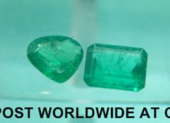 Two loose emerald gem stones, one emerald cut,