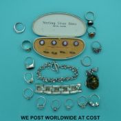 A collection of silver rings,