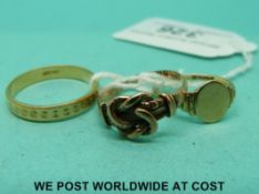 A 9ct gold ring in the form of a knot together with a 9ct gold signet ring (3.
