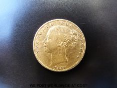 An1857 young head gold full sovereign shield reverse