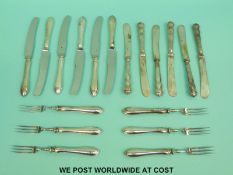 A collection of hallmarked silver-handled cutlery