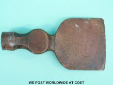 A 19thC bronze presentation axe head marked 'Presented to J. L. R.