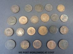 A collection of twenty George III and Victorian farthings, together with an Irish example,