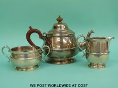A hallmarked silver three piece tea set, all Adie Brothers, tea pot Birmingham 1924,
