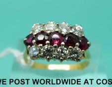 An 18ct gold ring set with a row of rubies with two rows of diamonds,