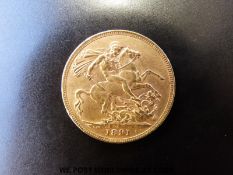 An 1891 gold full sovereign,