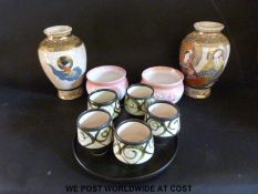 A pair of Japanese vases,