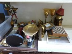A quantity of decorative items to include photo frames, large candle holders, blackamore figures,