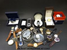 Twenty-seven various ladies and gentlemen's wristwatches, one marked Gucci, some in original boxes.