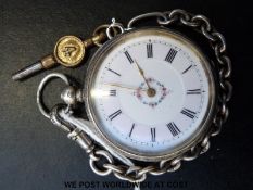 Swiss made ladies silver fob watch with gold hands and black Roman numerals to the floral decorated