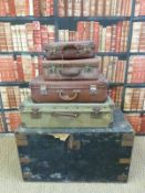 A metal bound steamer trunk and four vintage pieces of luggage (trunk H48xL84XW51)
