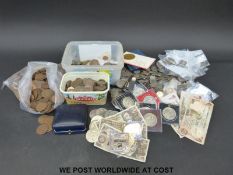A collection of UK and overseas coins, modern crowns etc.