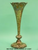 An American Art Nouveau white metal trumpet vase with foliate decoration in the manner of Tiffany,