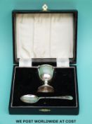 A cased hallmarked silver christening egg and spoon set