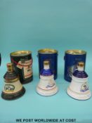 Thirteen boxed Bell's whisky bells and two smaller unboxed examples, each 75cl,