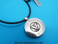 A silver pendant by Stephen Webster for Wedgwood depicting a bulldog 