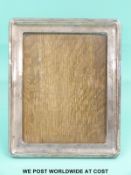A George V hallmarked silver photograph frame, Birmingham 1922,