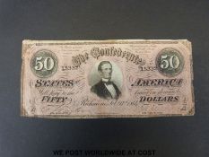 An 1861 50 dollar bill, Confederate States currency Civil War notes,