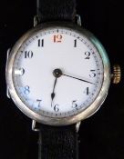 Rolex silver wristwatch with Arabic numerals to the white enamel face, on black leather strap,