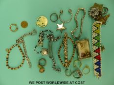 A collection of costume jewellery to include earrings, rings,