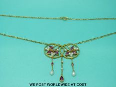 A yellow metal necklace formed of two overlapping circular sections,