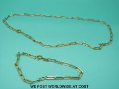 A 9ct gold necklace of elongated links and a similar 9ct gold bracelet (8.