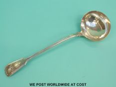 A Victorian hallmarked silver fiddle thread and shell pattern ladle, length 34cm,