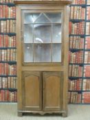 A 19th century astragal glazed oak floor standing corner cupboard (H215xW98cm)