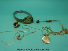 A 9ct gold cased watch, 9ct gold St Christopher,