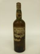 A vintage bottle of John Jameson Dublin whisky (label worn)