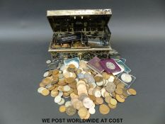 A metal coin box containing sundry coinage from Victoria onwards,