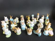 A collection of 28 Beswick Beatrix Potter figures to include ten with gold back stamps