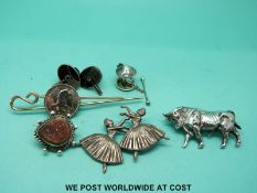 Two Victorian silver brooches, a silver and agate dagger brooch,