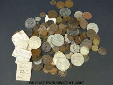 A collection of sundry coinage to include Victorian farthings, bronze pennies, medal coins,