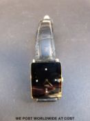 A ladies Rado Jubile watch set with four diamonds to the face,
