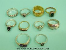 Ten silver rings set with amethyst, garnets,
