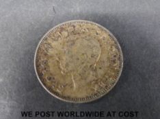 A 1937 shilling,
