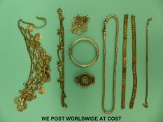 A collection of Eastern silver jewellery,