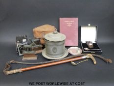 A hallmarked silver-mounted riding crop, WMF trays, biscuit barrel, camera,
