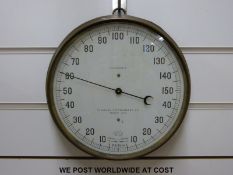 A large dial thermometer (22cm diameter dial)